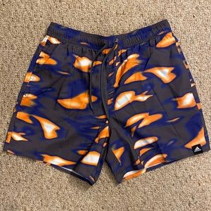 Adidas SOULEAF graphic swim shorts